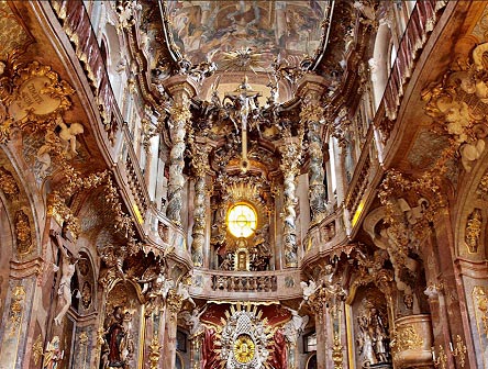 El interés por el color, la luz,  la preocupación espacial y el movimiento,  así como la escenografía y la fusión de las artes  se aprecia en la iglesia de San Juan Nepomuceno de Munich