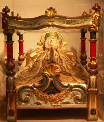 Virgen de la cama